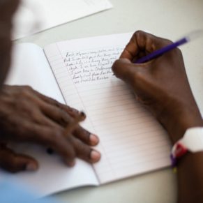 06/26/17 -- Boston, MA -- Larry Bates works on a piece of writing during a creative writing group for the homeless at the Barbara McInnis House on June 26, 2017, in Boston, Massachusetts. (Kayana Szymczak for STAT)